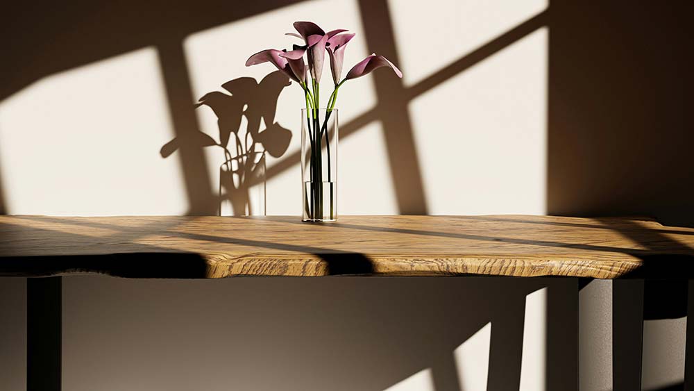 Wooden table with a vase of flowers on top